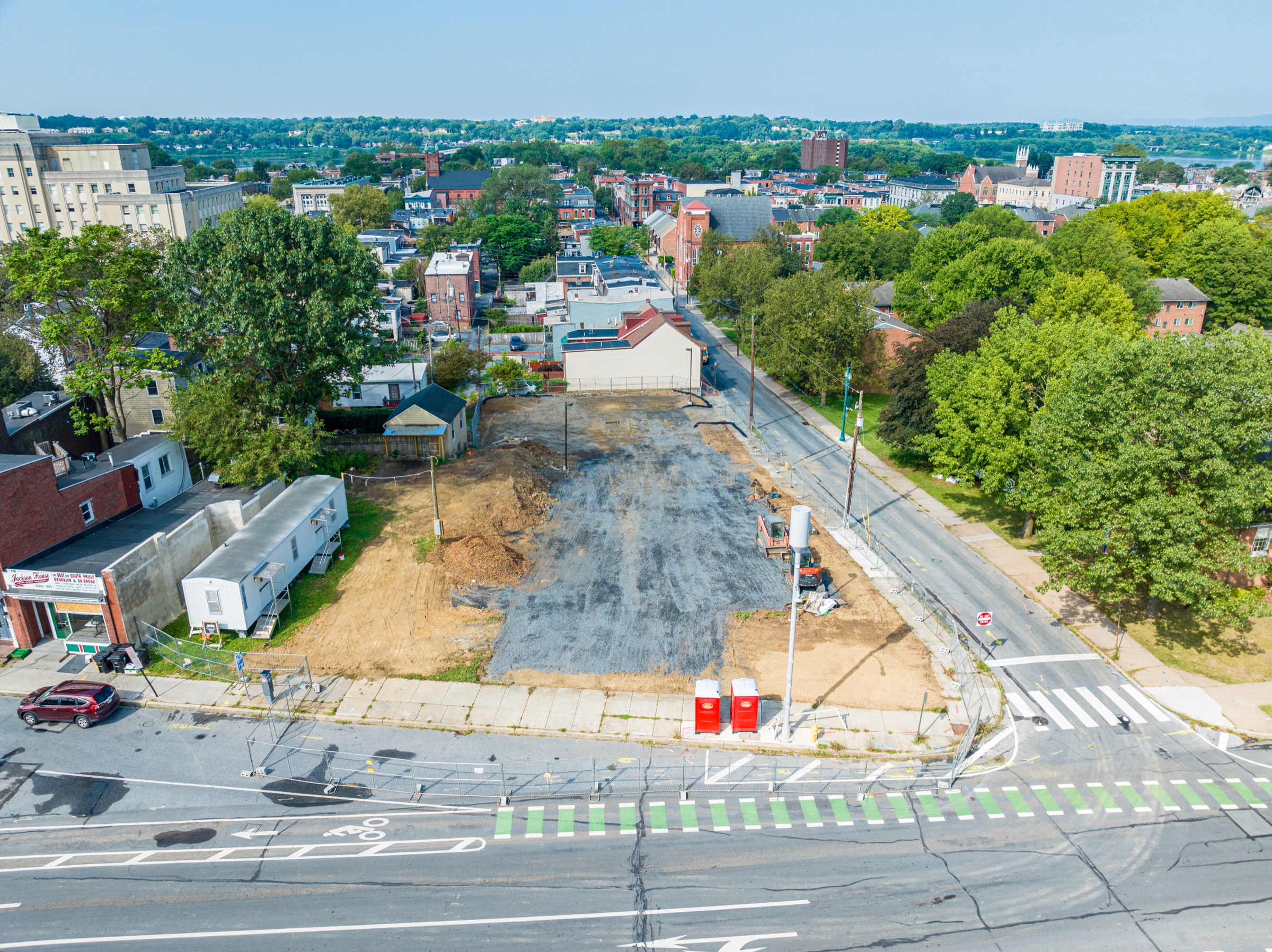 Oblique aerial view of early site work at Bethel Village