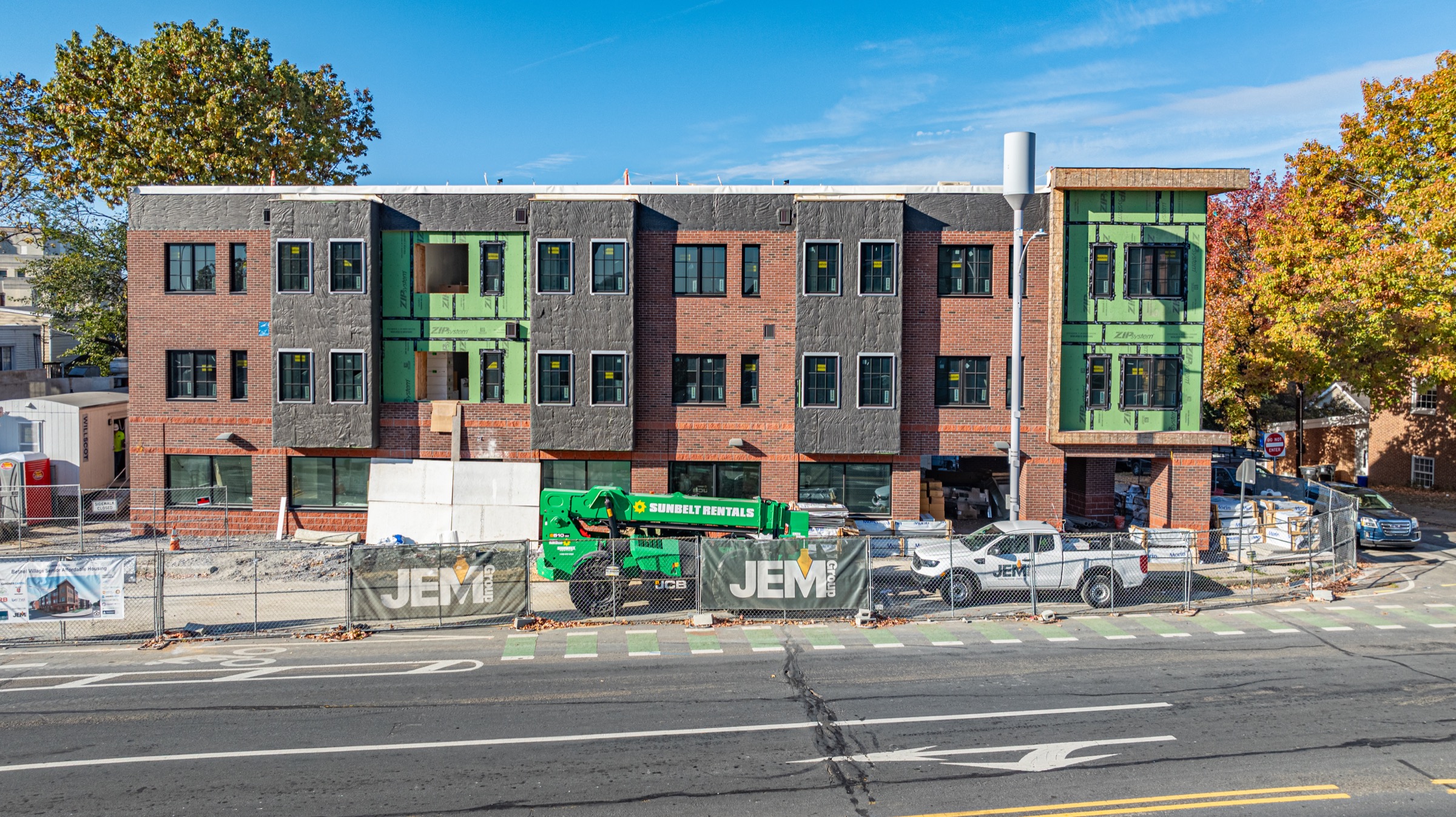 Front elevation of Bethel Village during exterior completion